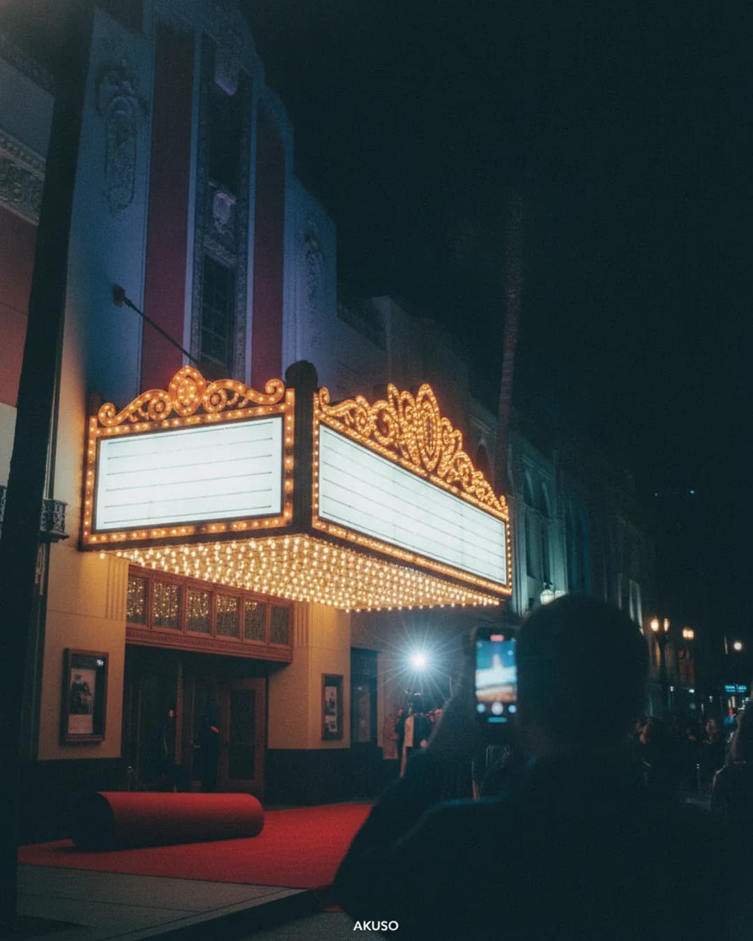 movie theater marquee at night